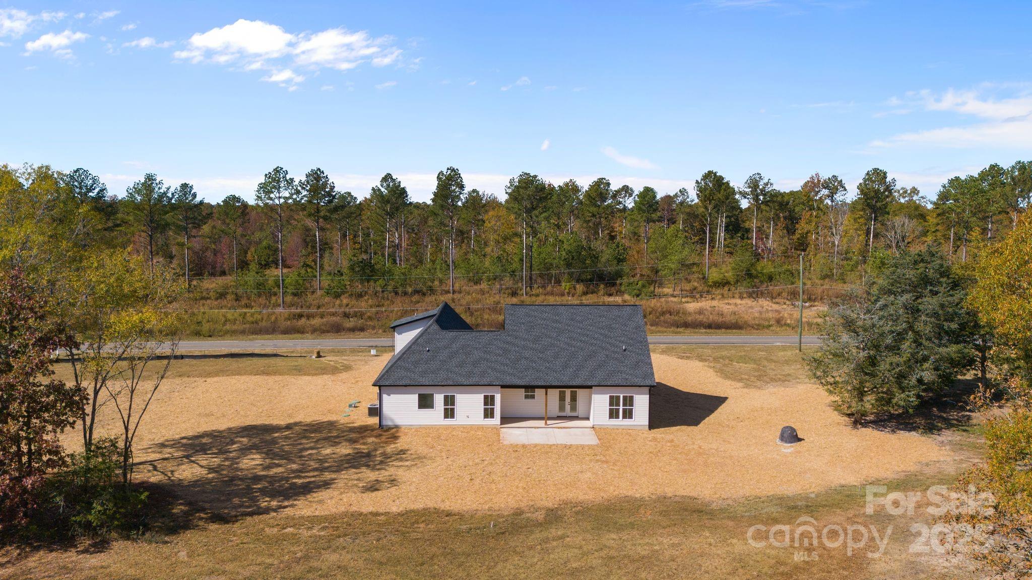 1050 Tom Joye Road Clover, SC 29710 - Photo 3 of 29 a view of a lake with a mountain in the background