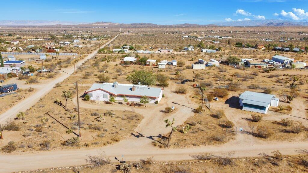 925 Inca Trail Yucca Valley, CA 92284 - Photo 3 of 31 an aerial view of residential houses with outdoor space