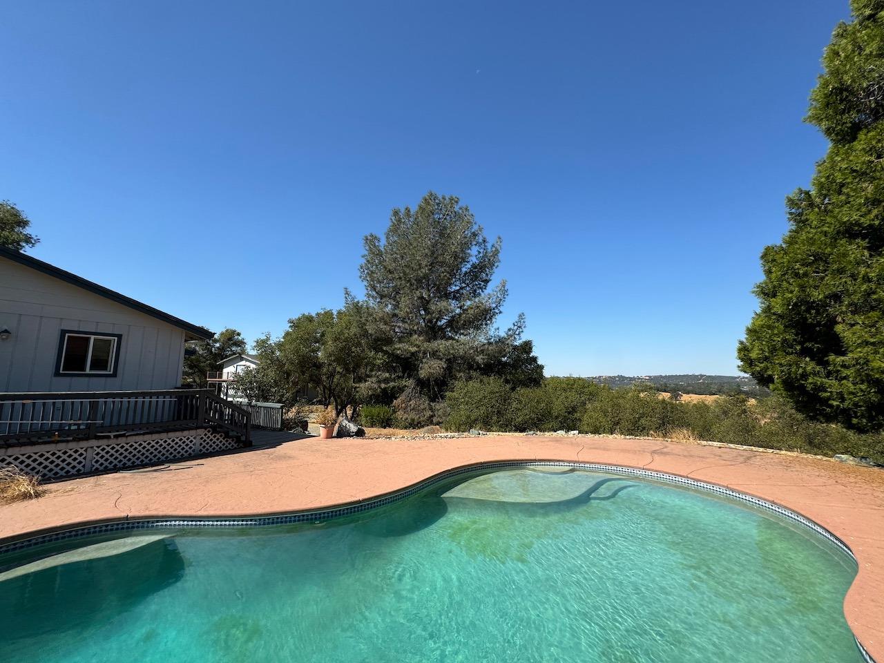 14950 Clinton Road Jackson, CA 95642 - Photo 17 of 50 a view of swimming pool with a yard