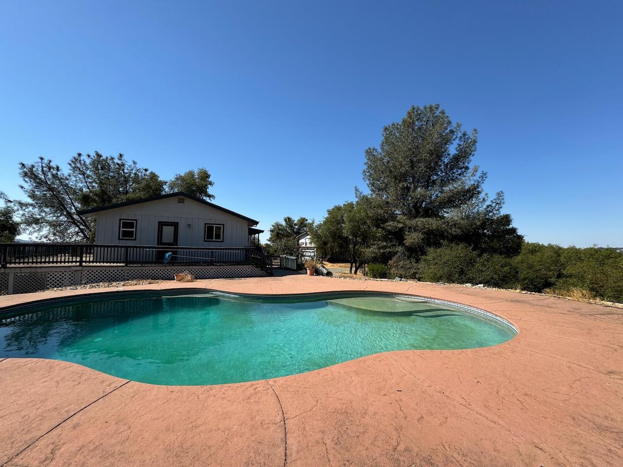 14950 Clinton Road Jackson, CA 95642 - Photo 2 of 50 a view of a house with swimming pool