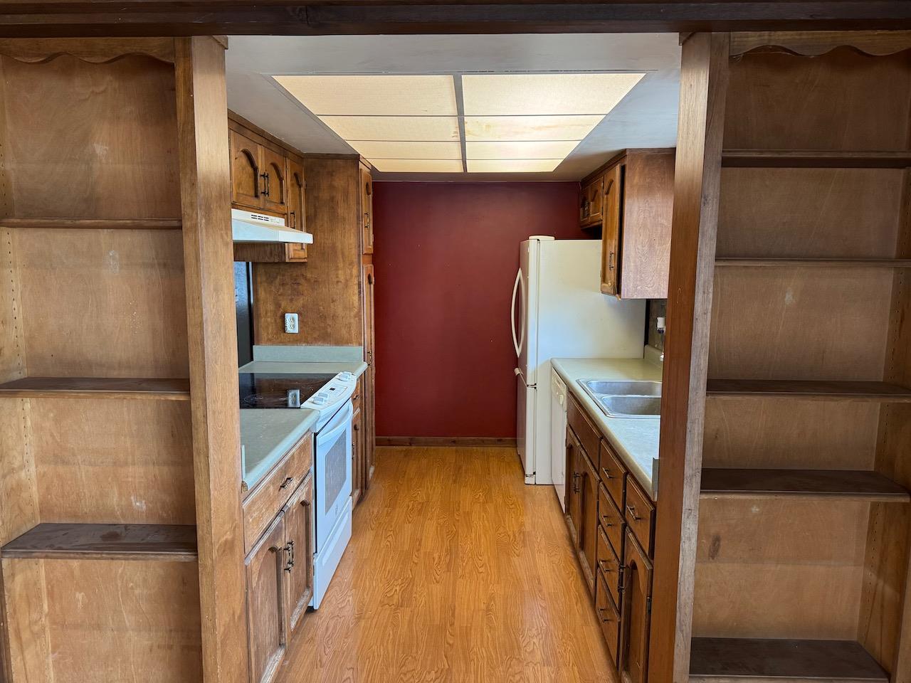 14950 Clinton Road Jackson, CA 95642 - Photo 26 of 50 a kitchen with sink cabinets and refrigerator