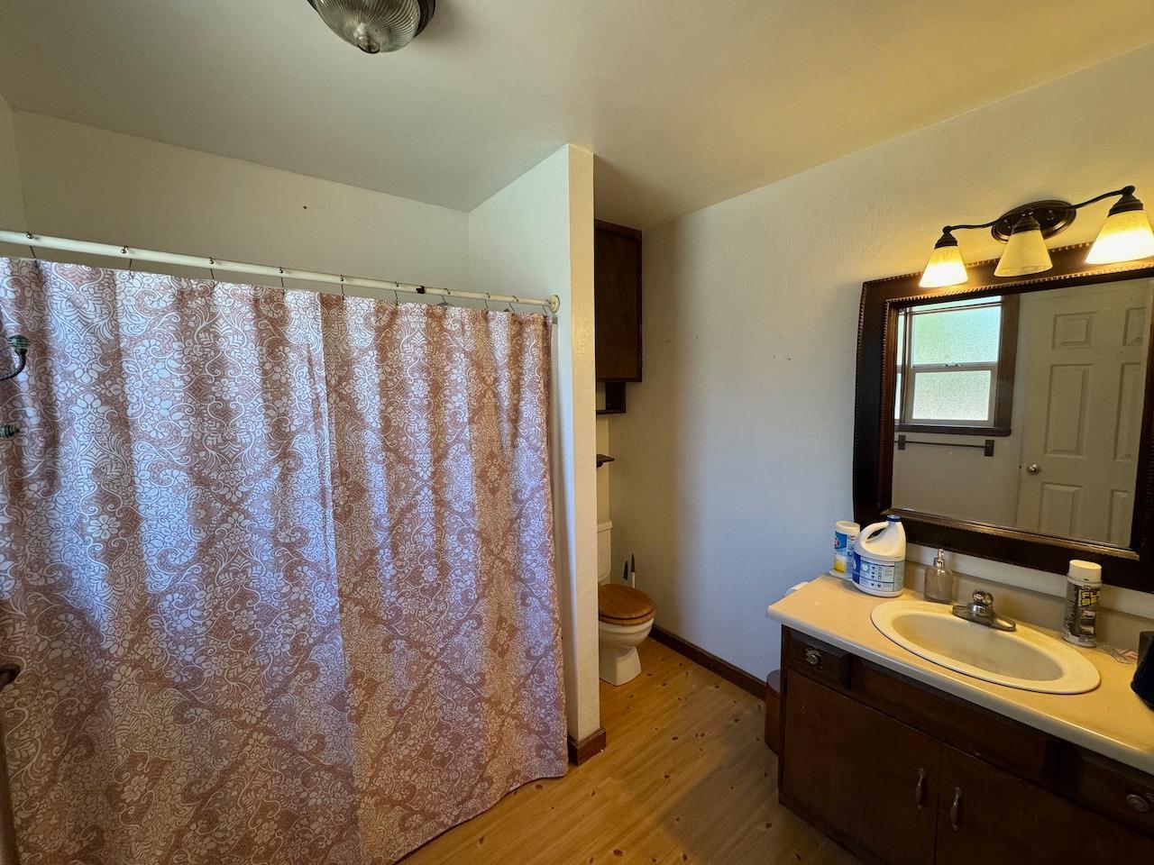 14950 Clinton Road Jackson, CA 95642 - Photo 30 of 50 a bathroom with a sink and a mirror