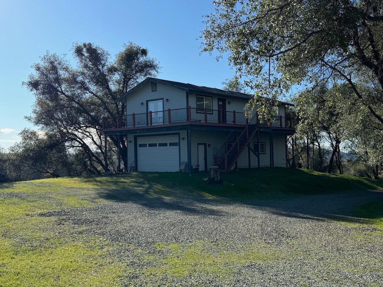 14950 Clinton Road Jackson, CA 95642 - Photo 3 of 50 a view of a house with a yard