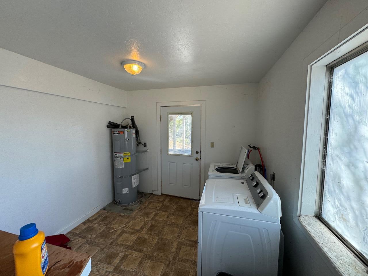 14950 Clinton Road Jackson, CA 95642 - Photo 36 of 50 a bedroom with a bed and window