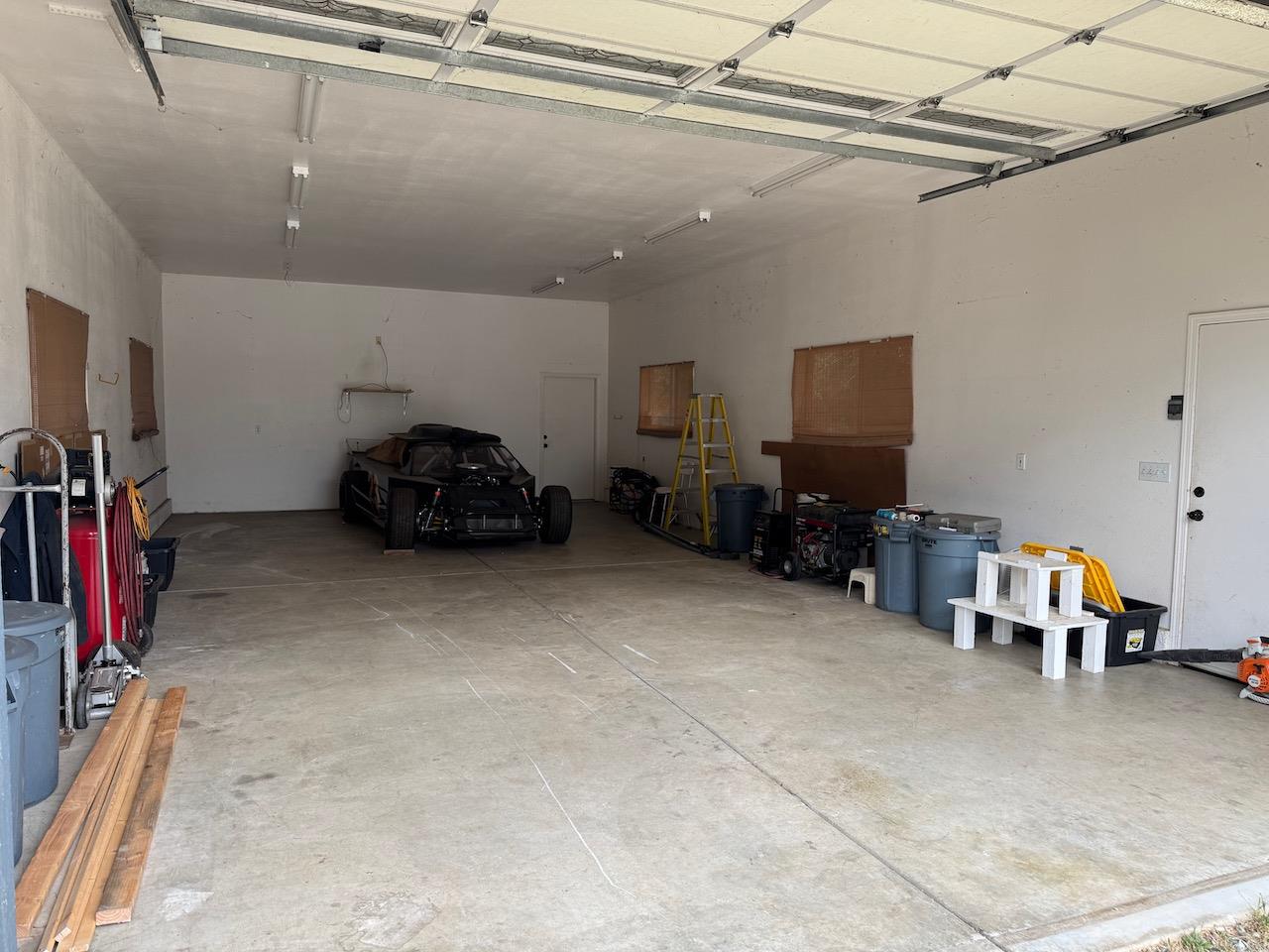 14950 Clinton Road Jackson, CA 95642 - Photo 42 of 50 a room with gym equipment and a mirror