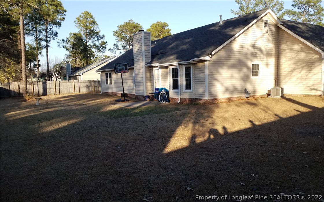 748 Rim Road Fayetteville, NC 28314 - Photo 3 of 18 a view of a house with backyard