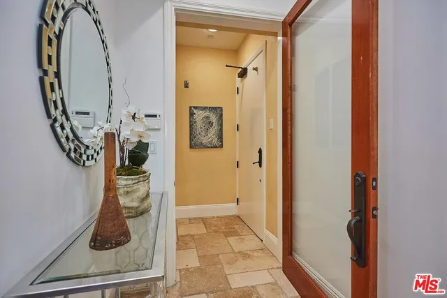 wooden floor with white walls