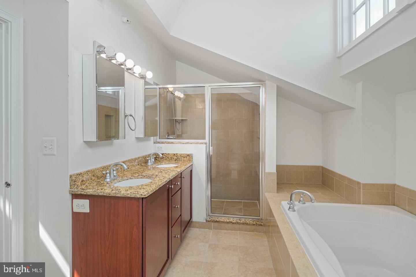 1 Academy Circle, Unit 319 Philadelphia, PA 19146 - Photo 16 of 20 Master bath with a tub and a shower.