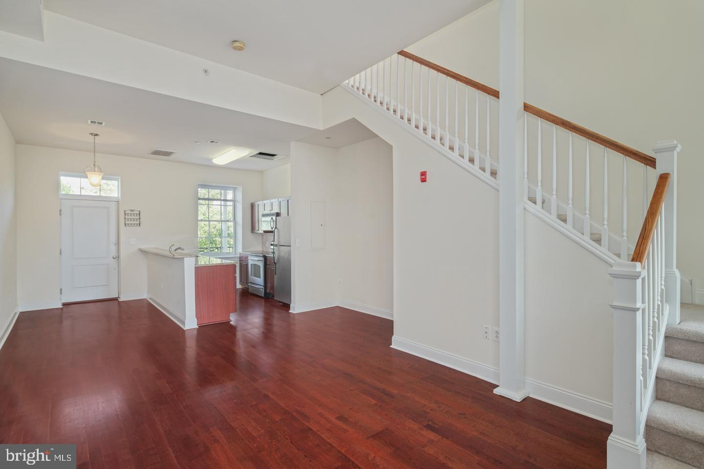 1 Academy Circle, Unit 319 Philadelphia, PA 19146 - Photo 7 of 20 Come in from the balcony to this expansive space.
