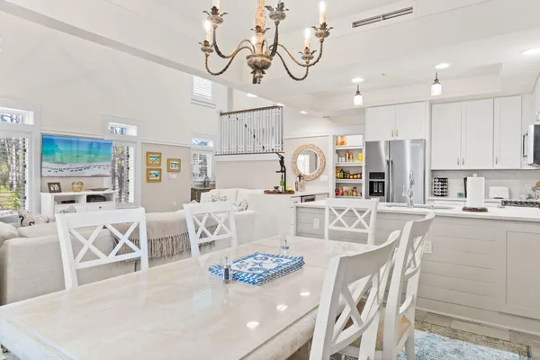 a spacious bathroom with a shower sink and mirror