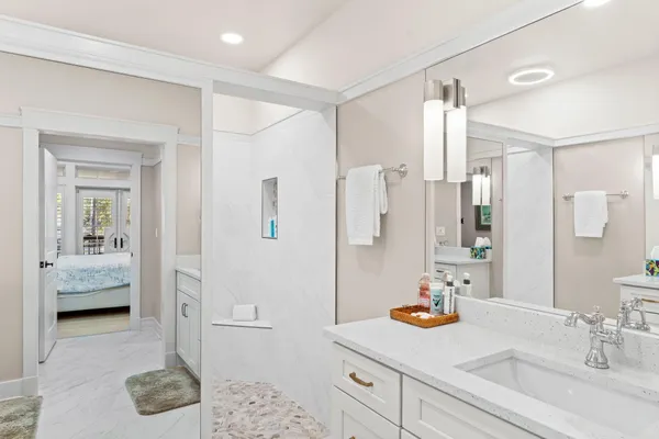 a view of a chair and table in the balcony