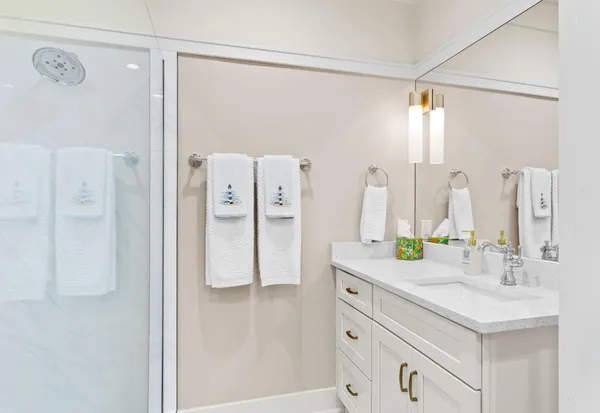 a view of a house with wooden deck