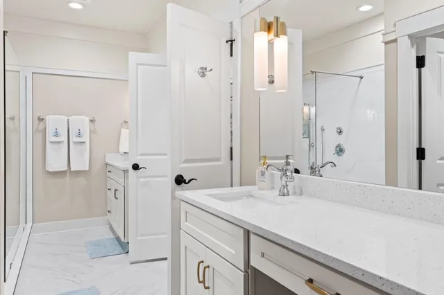 a view of lake with a large tree