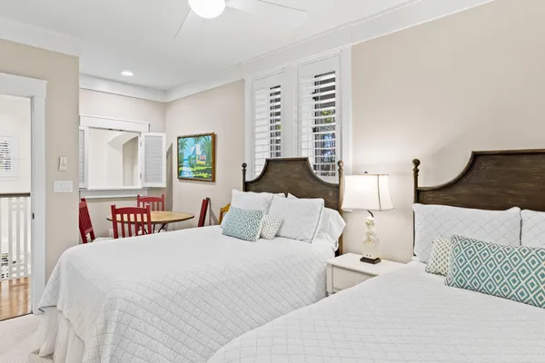 a view of a swimming pool with outdoor seating