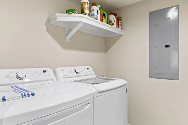 a view of a swimming pool with outdoor seating