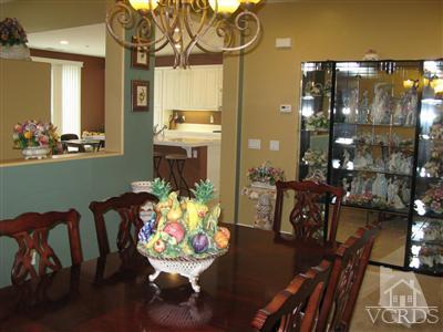 640 Riviera Court Oxnard, CA 93035 - Photo 2 of 12 a living room with furniture and chandelier