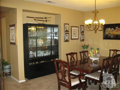 640 Riviera Court Oxnard, CA 93035 - Photo 3 of 12 a view of a dining room with furniture window and outside view
