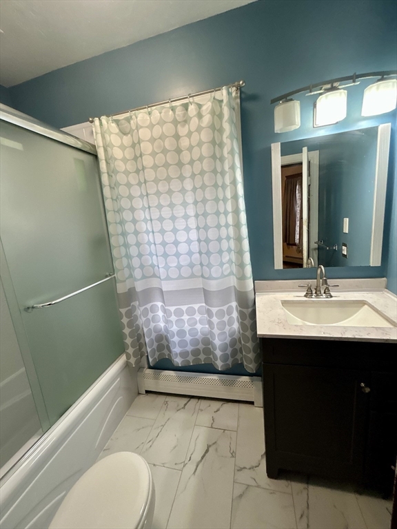 3 Gloucester Road Worcester, MA 01607 - Photo 4 of 12 a bathroom with a sink and a mirror