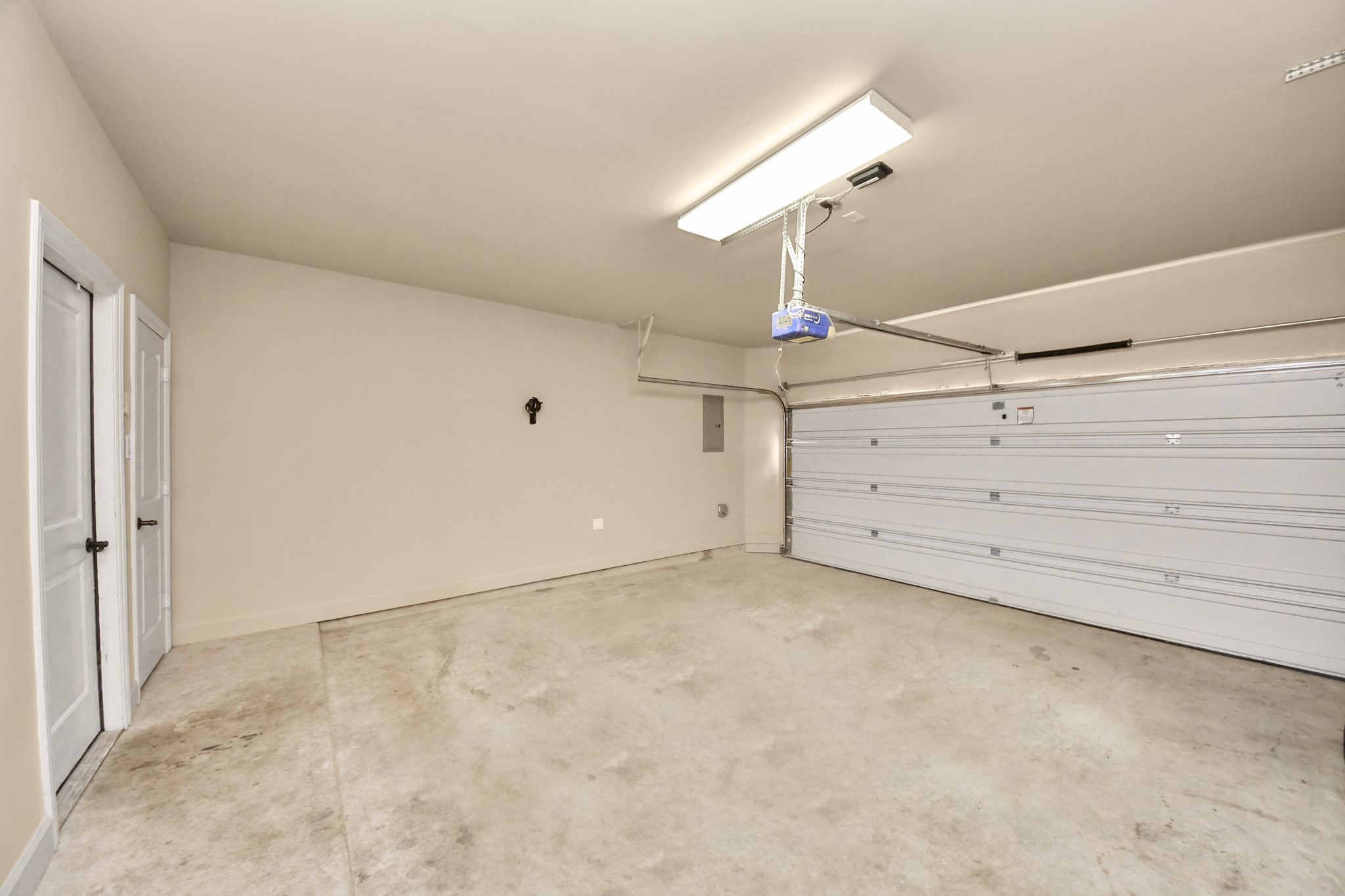 2830 Polk Street Houston, TX 77003 - Photo 17 of 21 A two-car attached garage provides convenience and additional storage space.