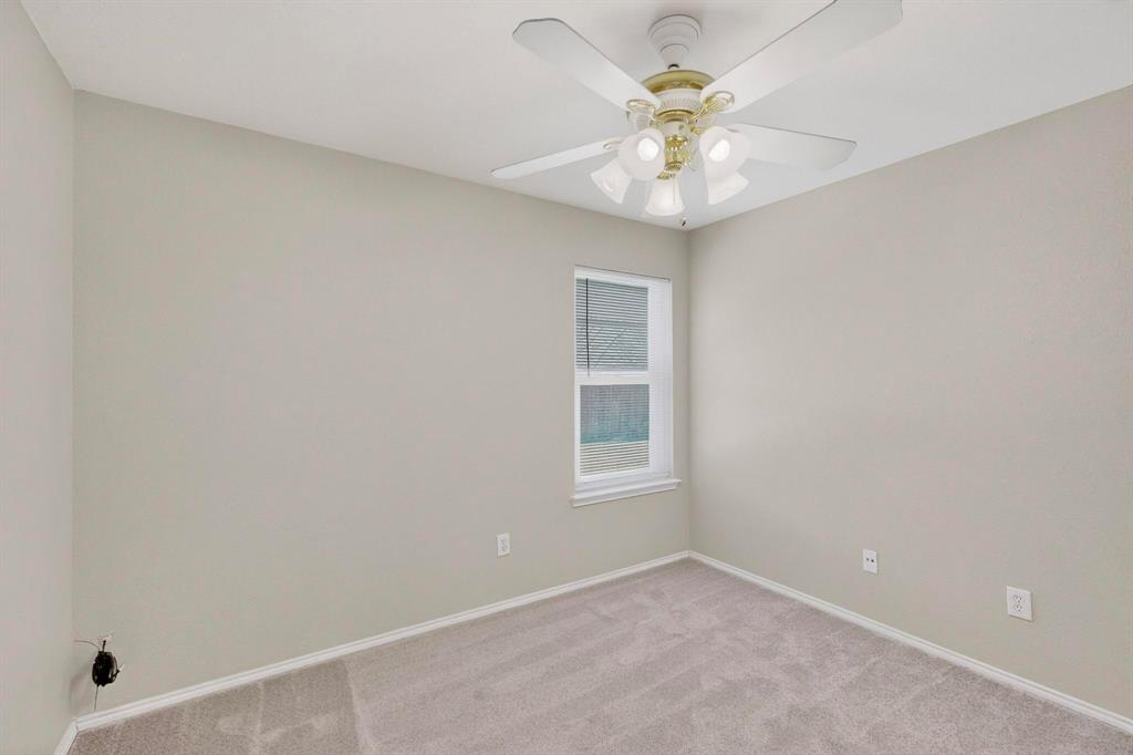 1025 Caleb Street Burleson, TX 76028 - Photo 23 of 38 Spare bedroom one