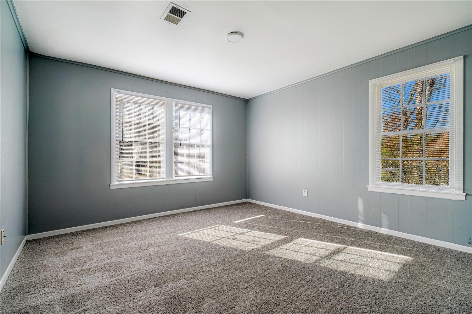 1114 Brownlee Road Memphis, TN 38116 - Photo 23 of 32 Empty room with carpet and baseboards