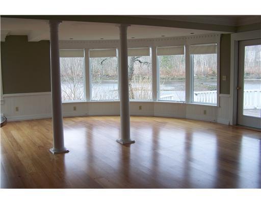 50 Robbins Road Belfast, ME 04915 - Photo 4 of 20 Living Room. Spectacular windows and...