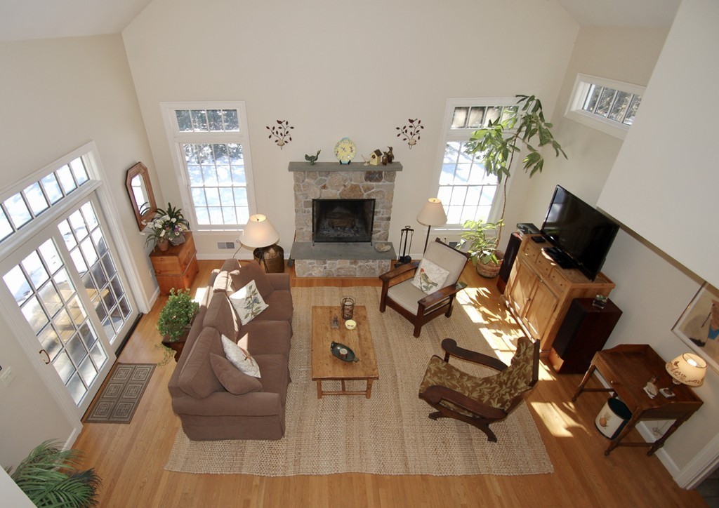 23 Westwood Road Wellesley, MA 02482 - Photo 6 of 20 a living room with furniture and a fireplace