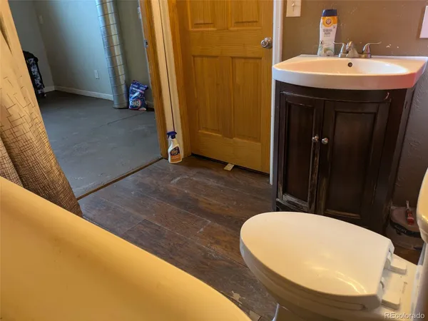 a bathroom with a sink and mirror