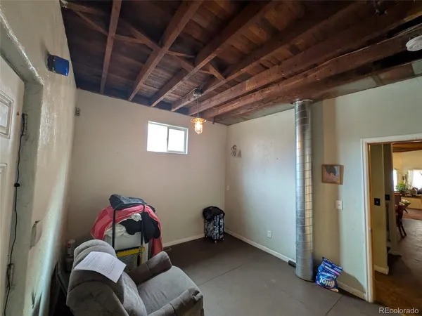 a room with furniture and a chandelier
