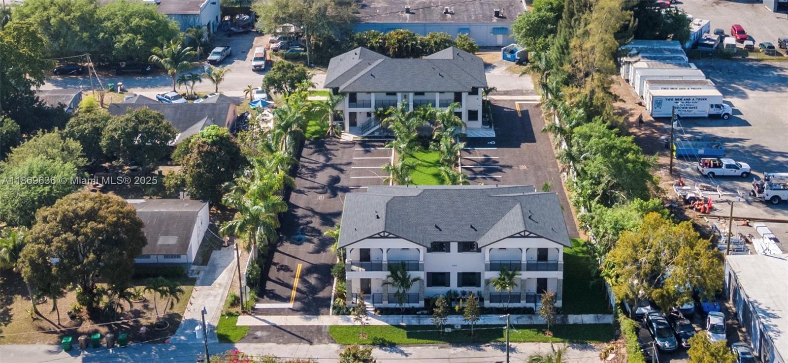 5750 Southwest 44th Street, Unit 201 Davie, FL 33314 - Photo 5 of 26 an aerial view of multiple houses