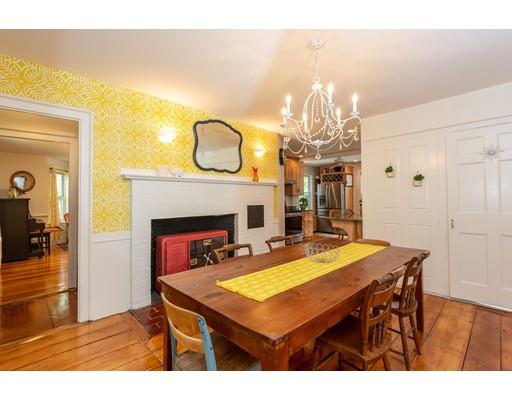 90 County Road Ipswich, MA 01938 - Photo 9 of 42 a view of a dining room with furniture and a chandelier