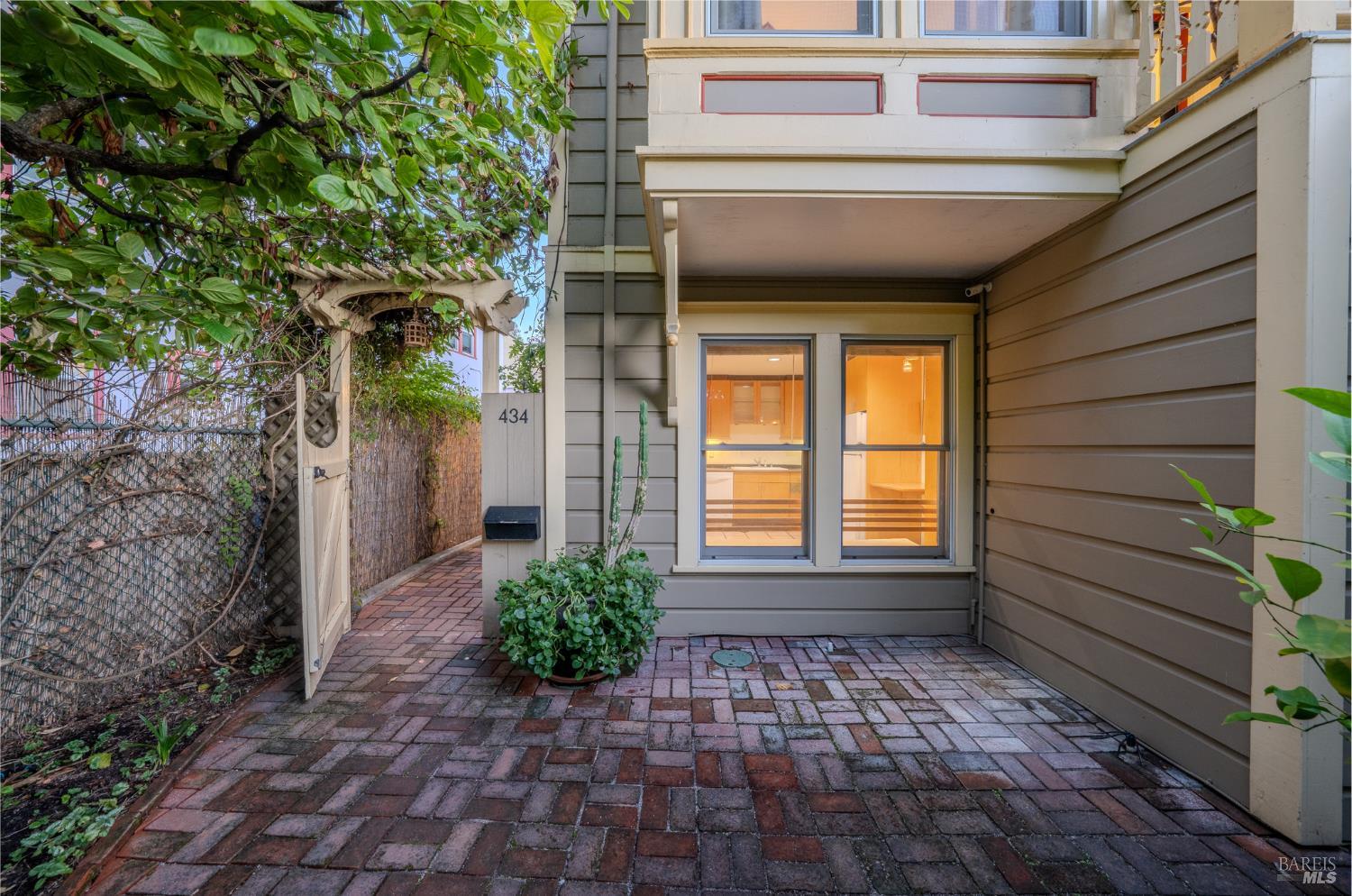 432 8th Street Santa Rosa, CA 95401 - Photo 23 of 40 a view of house with backyard and garden