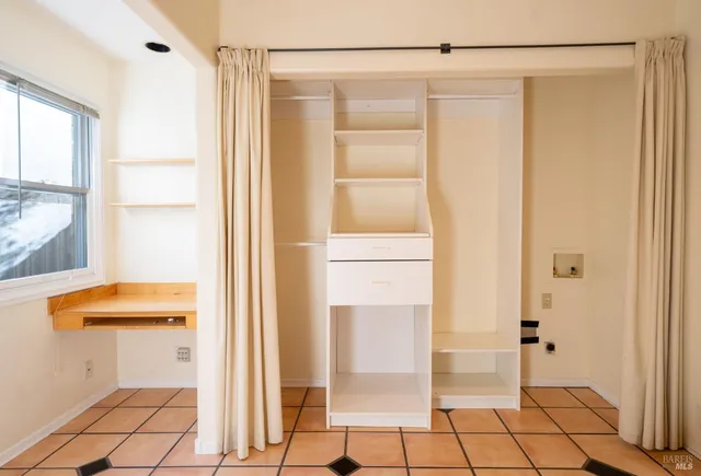 a bathroom with a shower and a toilet