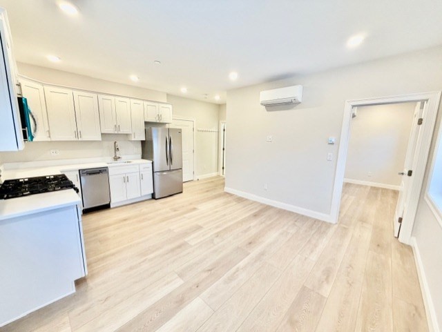 220 Winthrop Street, Unit 302 Winthrop, MA 02152 - Photo 3 of 10 a view of a kitchen with a sink