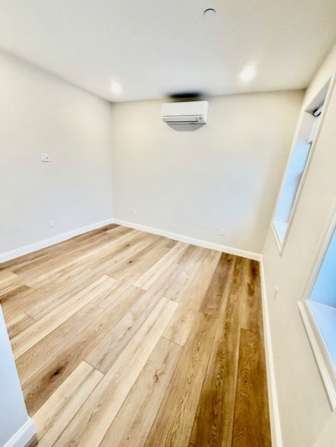 220 Winthrop Street, Unit 302 Winthrop, MA 02152 - Photo 7 of 10 a view of small space with wooden floor