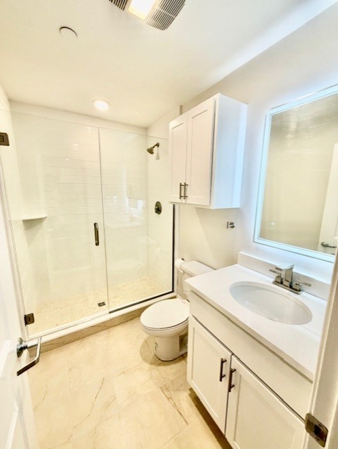 220 Winthrop Street, Unit 302 Winthrop, MA 02152 - Photo 10 of 10 a bathroom with a sink toilet and shower