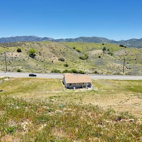 a view of an ocean and a mountain
