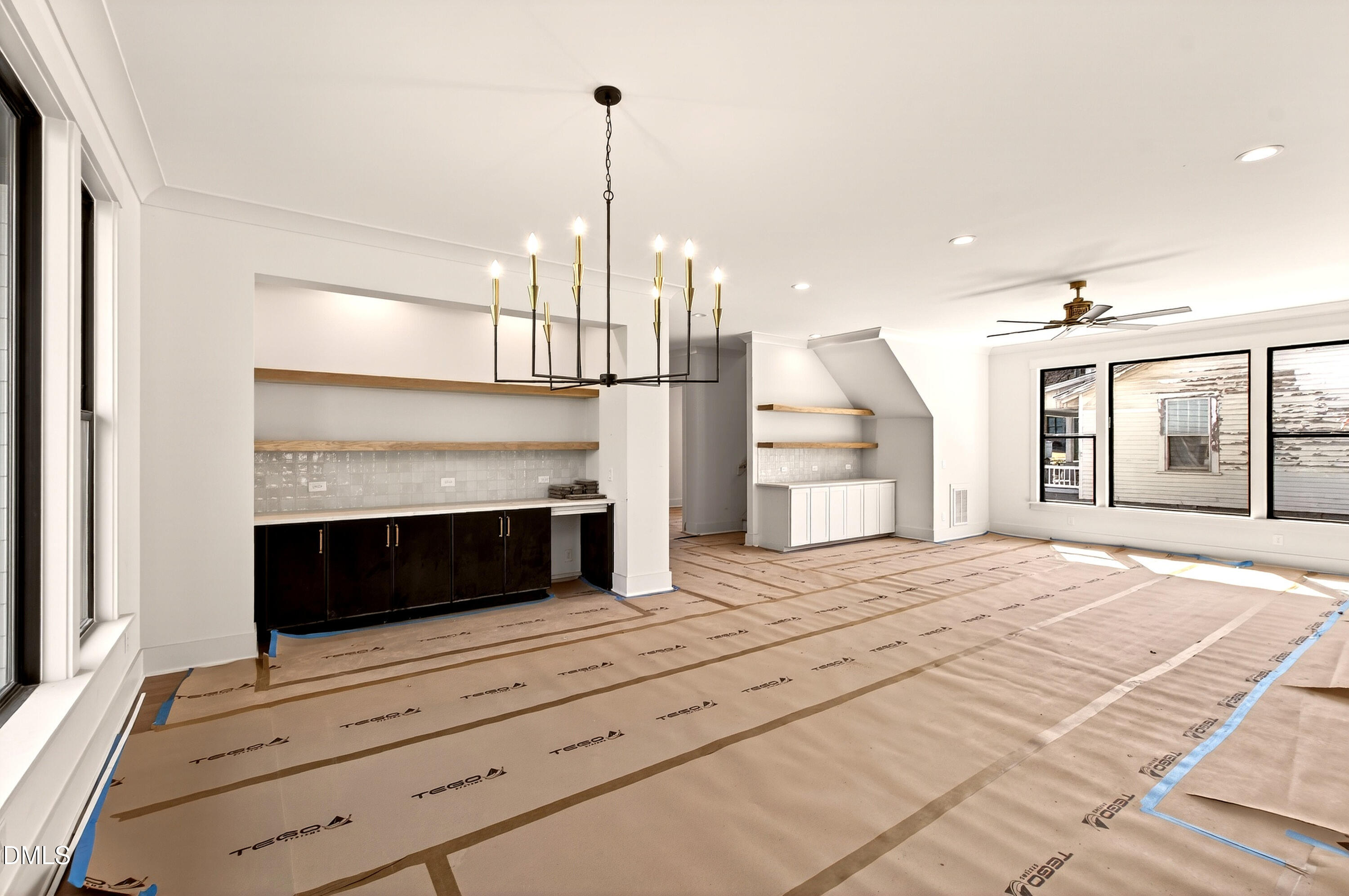 909 Oberlin Road Raleigh, NC 27605 - Photo 12 of 59 a view of an empty room and fire place