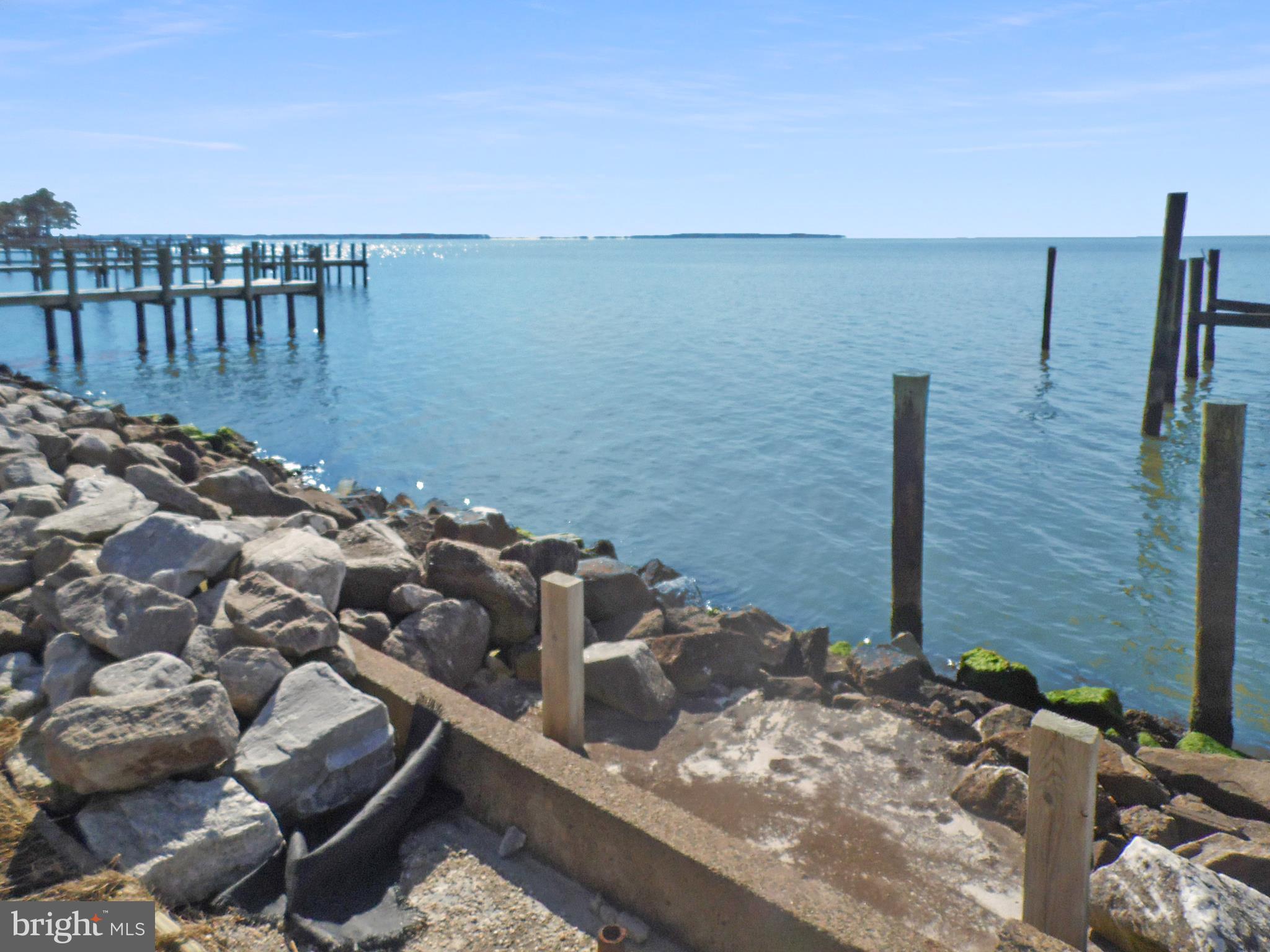 20138 Nanticoke Road Nanticoke, MD 21840 - Photo 2 of 29 Protected shore line boulders