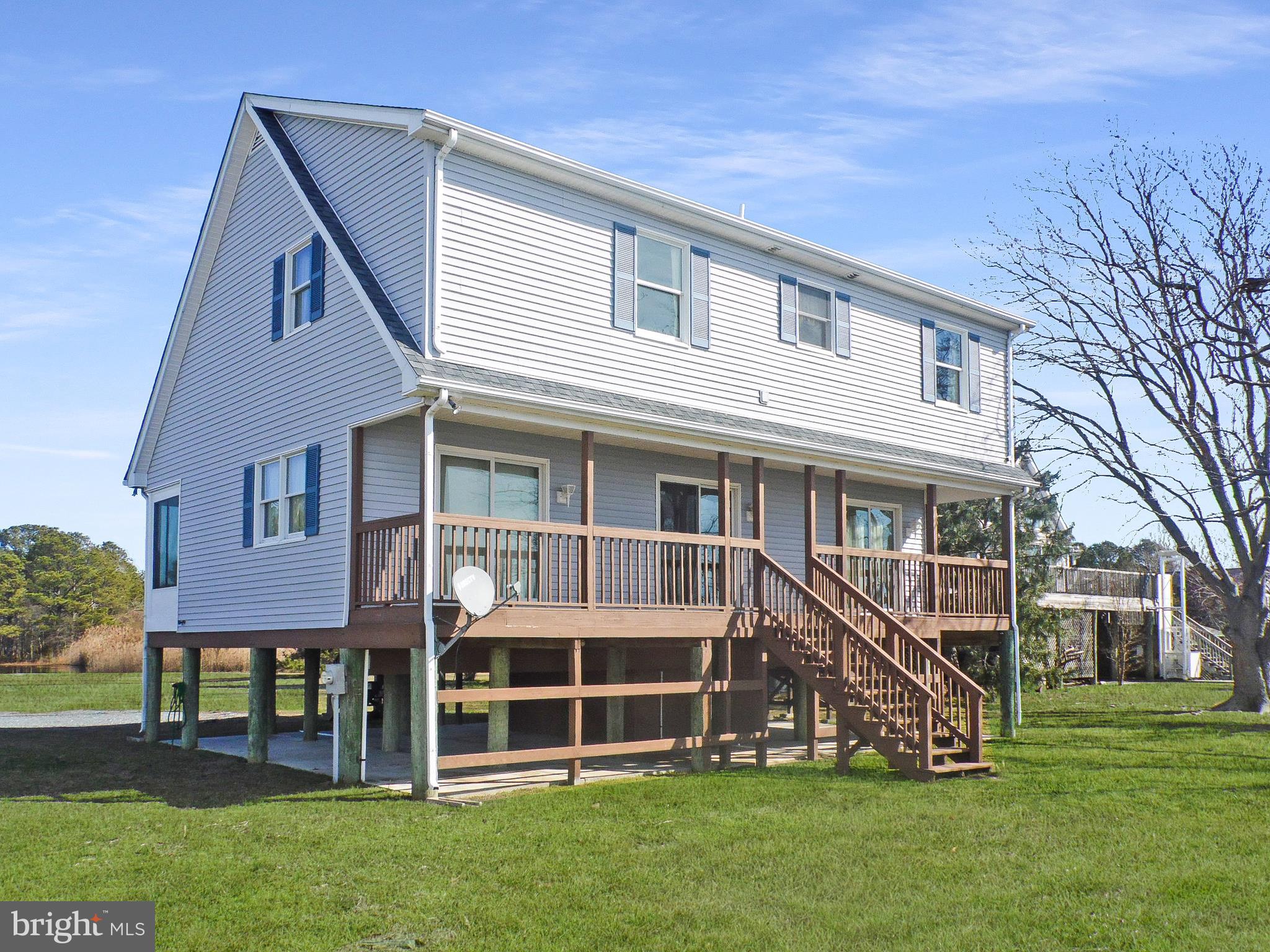 20138 Nanticoke Road Nanticoke, MD 21840 - Photo 5 of 29 Full length porch to take in the sunsets!