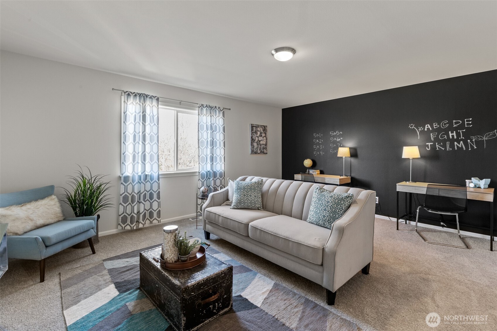 32302 135th Place Southeast Sultan, WA 98294 - Photo 20 of 32 a living room with furniture and a flat screen tv