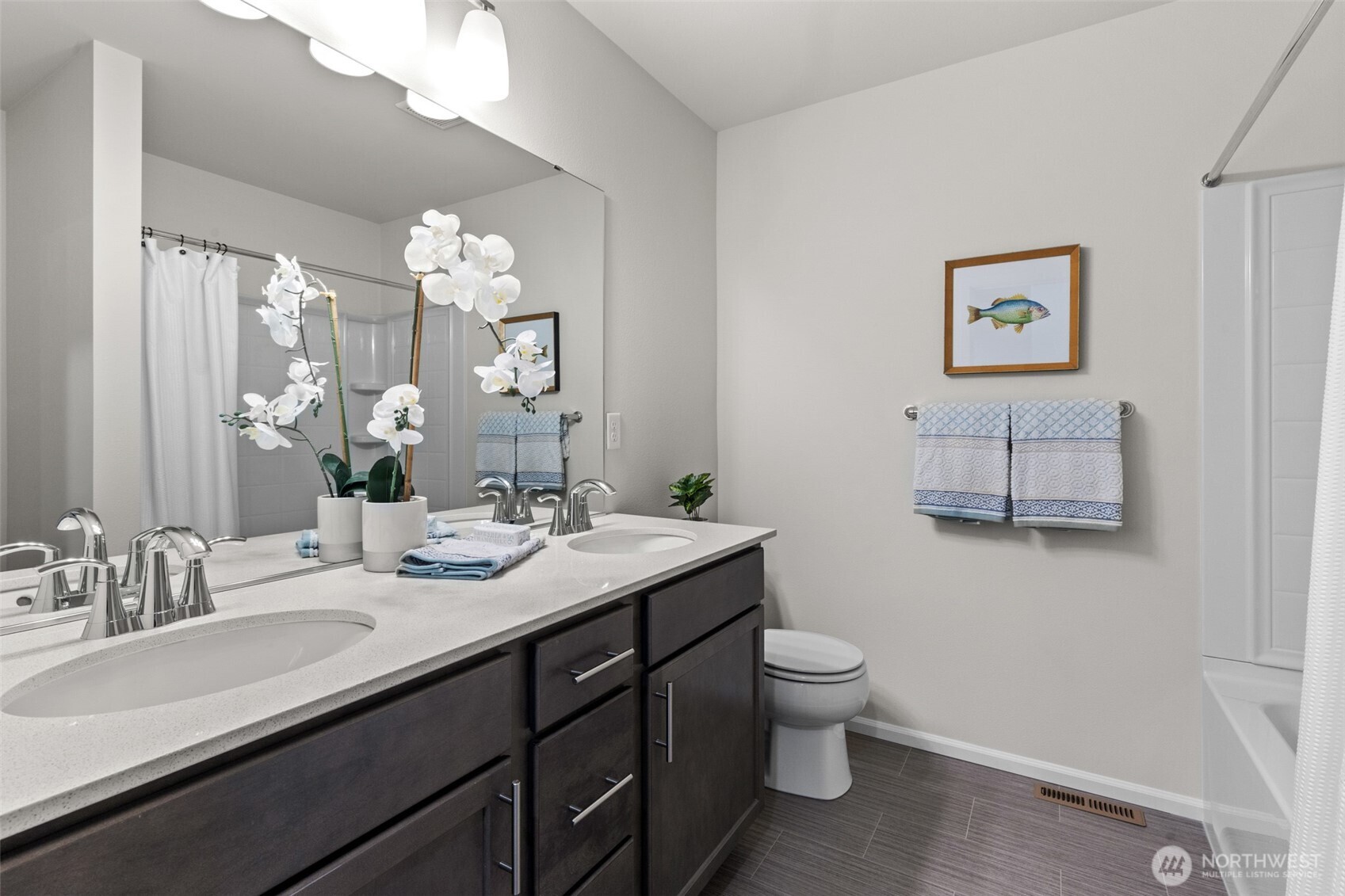 32302 135th Place Southeast Sultan, WA 98294 - Photo 24 of 32 a bathroom with a double vanity sink and a mirror