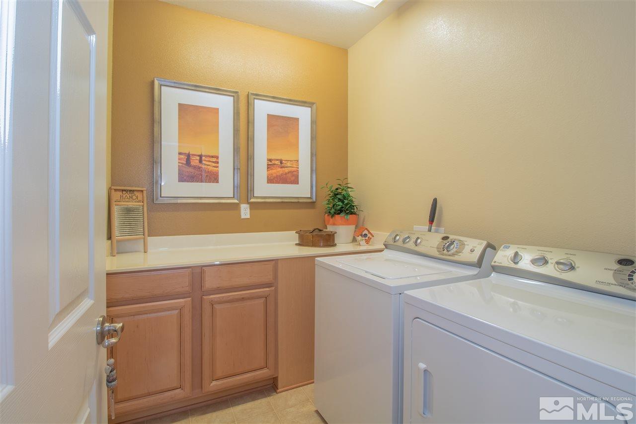 2000 Angel Ridge Drive Reno, NV 89521 - Photo 13 of 18 a utility room with dryer and washer