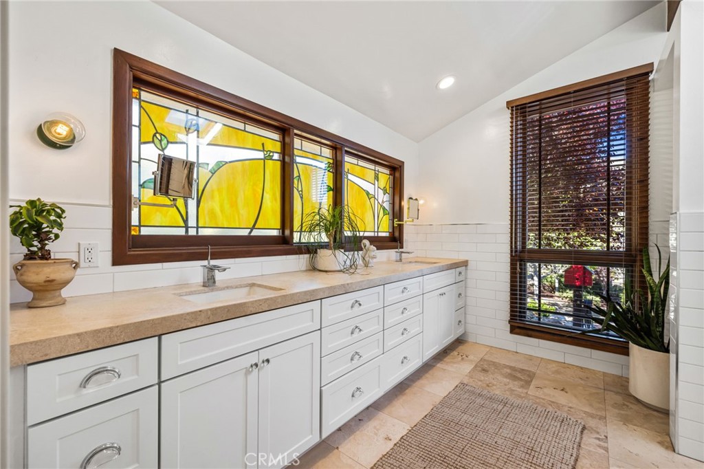 59353 Hop Patch Spring Road Mountain Center, CA 92561 - Photo 16 of 68 a bathroom with a granite countertop sink mirror and double