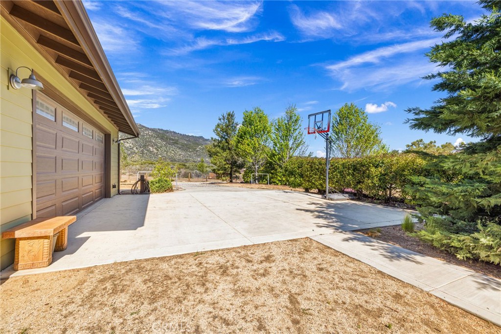 59353 Hop Patch Spring Road Mountain Center, CA 92561 - Photo 29 of 68 a view of a backyard of a house