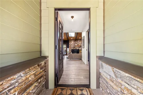 a spacious bedroom with a bed and a window