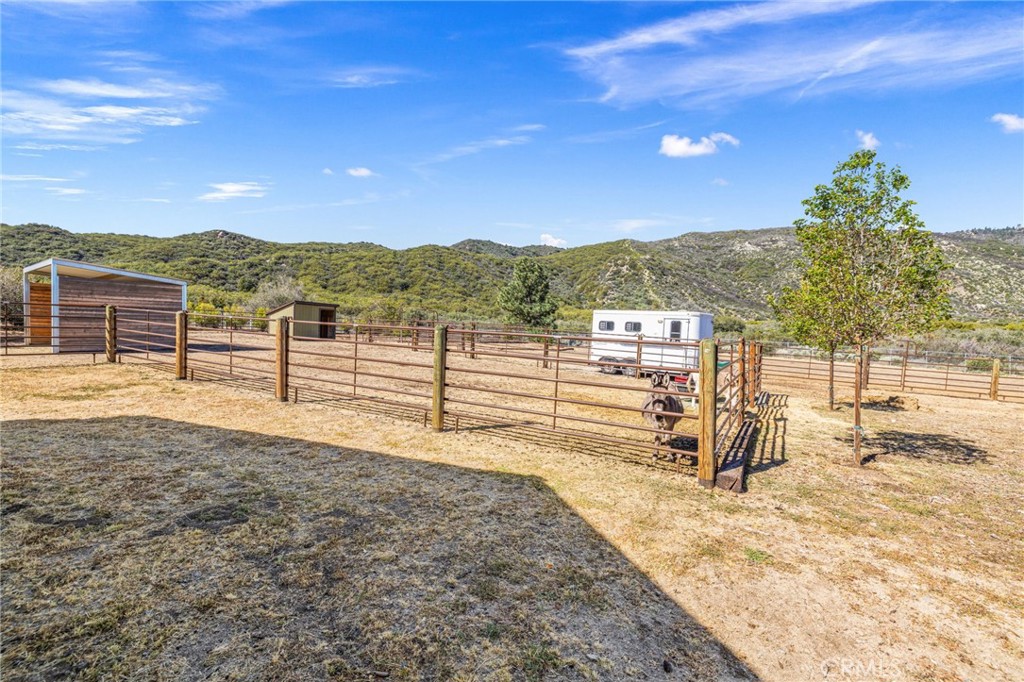 59353 Hop Patch Spring Road Mountain Center, CA 92561 - Photo 42 of 68 a view of a terrace with a lake