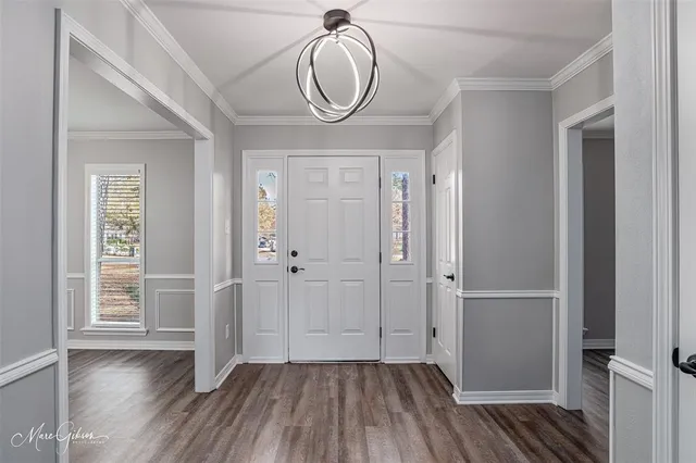 a view of room with wooden floor and window