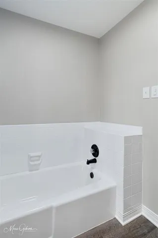a bathroom with a bathtub