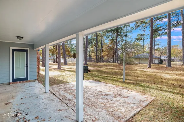 a view of a room with a large window